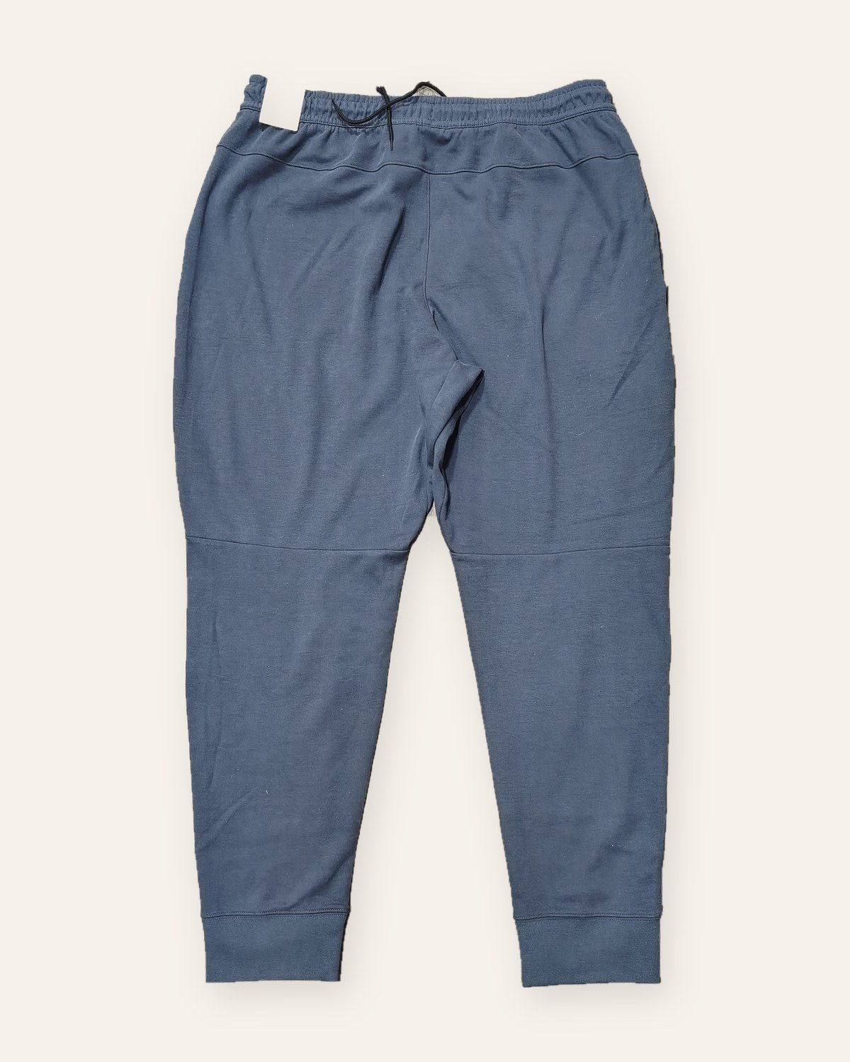 Nike Tech Essentials joggers slate blue – back view