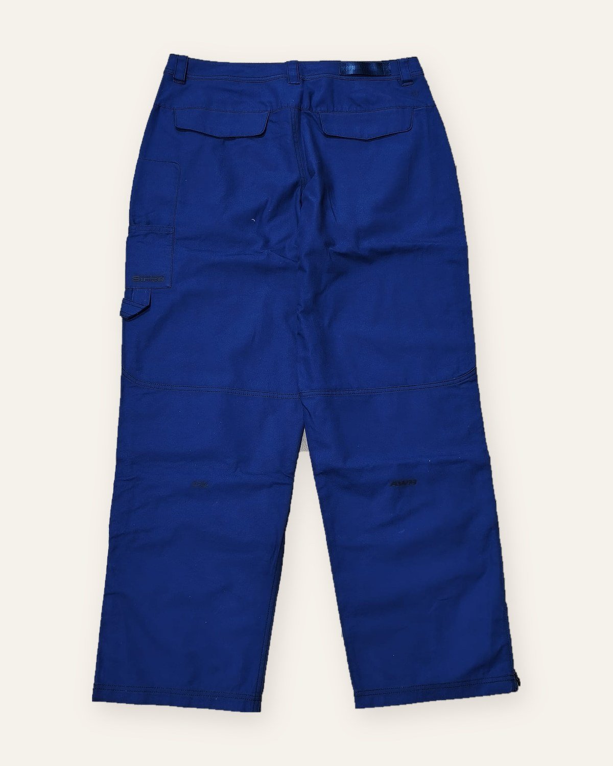 Nike x NOCTA x L'Art pants deep royal blue – back view with flap pockets
