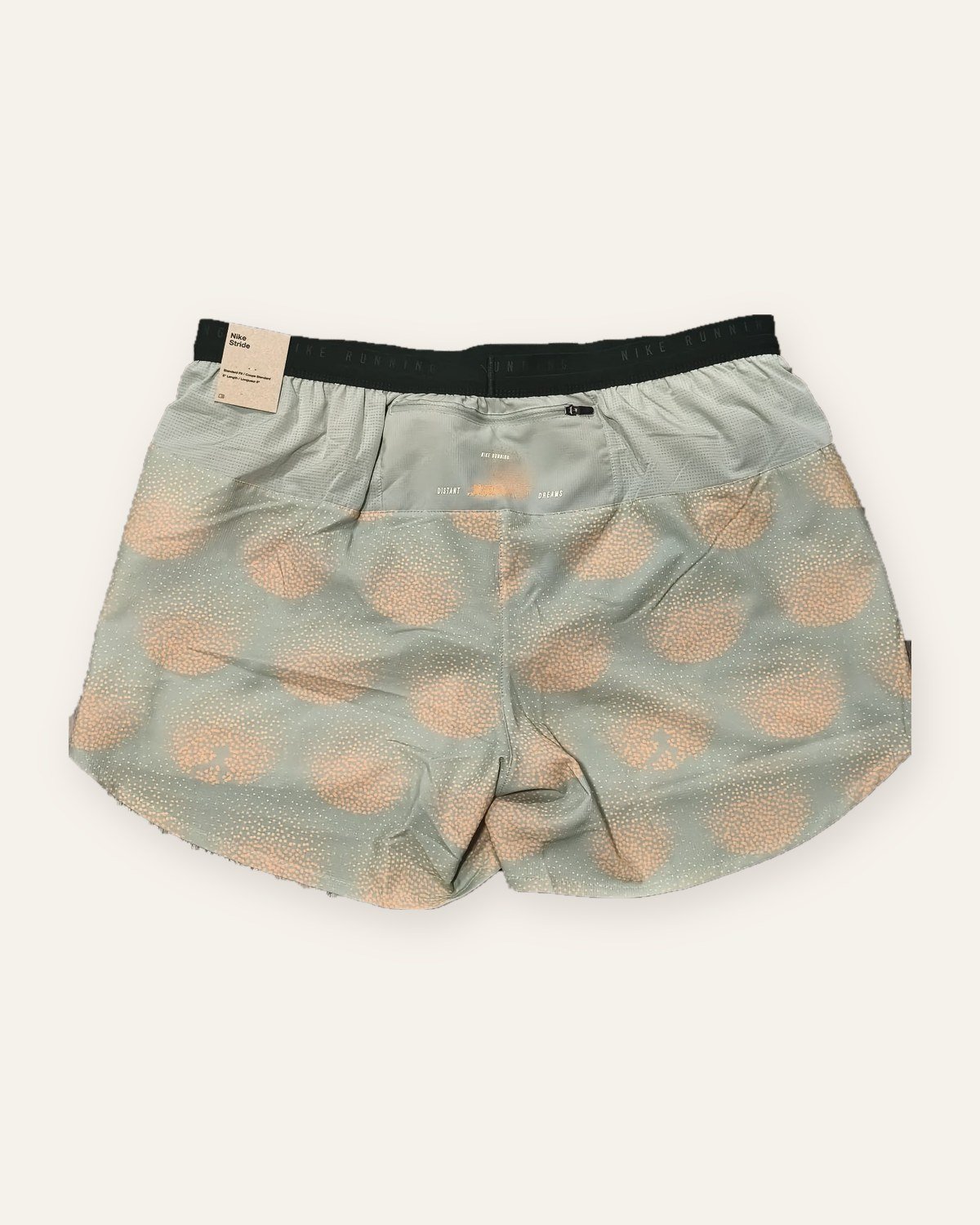 Nike Stride running shorts Jade Horizon print – back view with zipped pocket