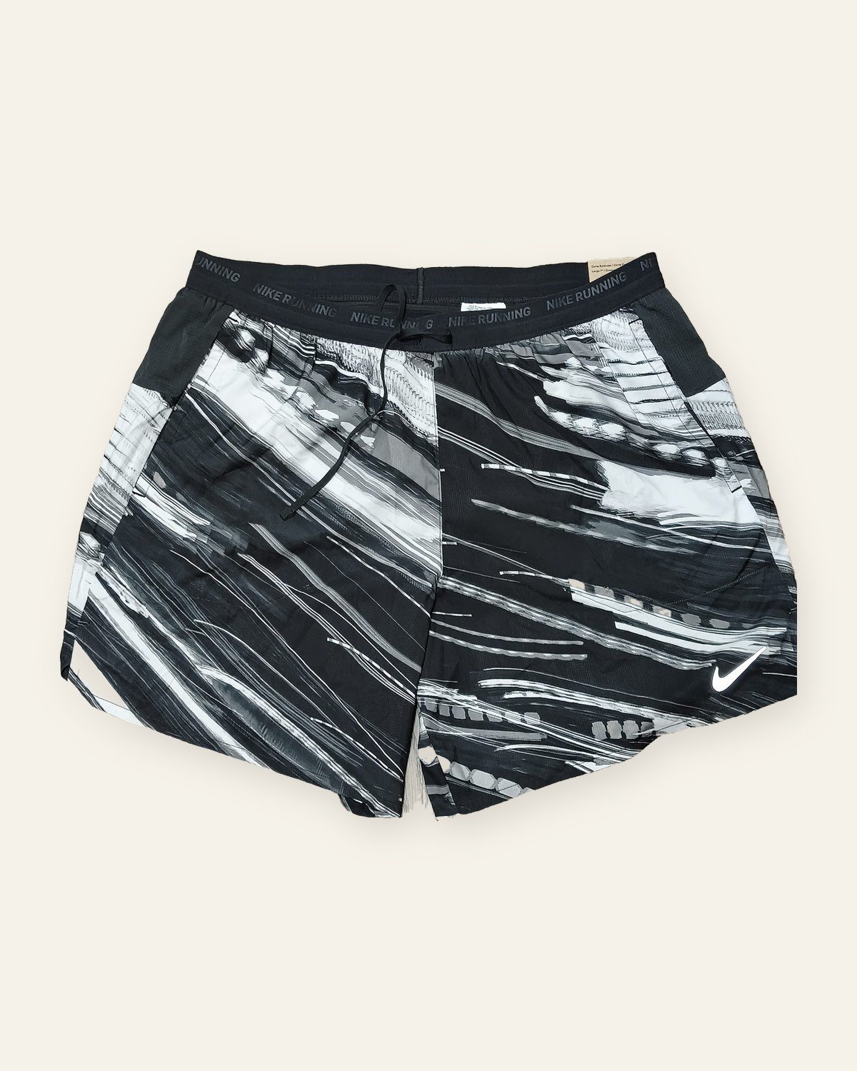 Nike Stride Dri-FIT 7-inch Brief-Lined Running Shorts, Black Print – front view