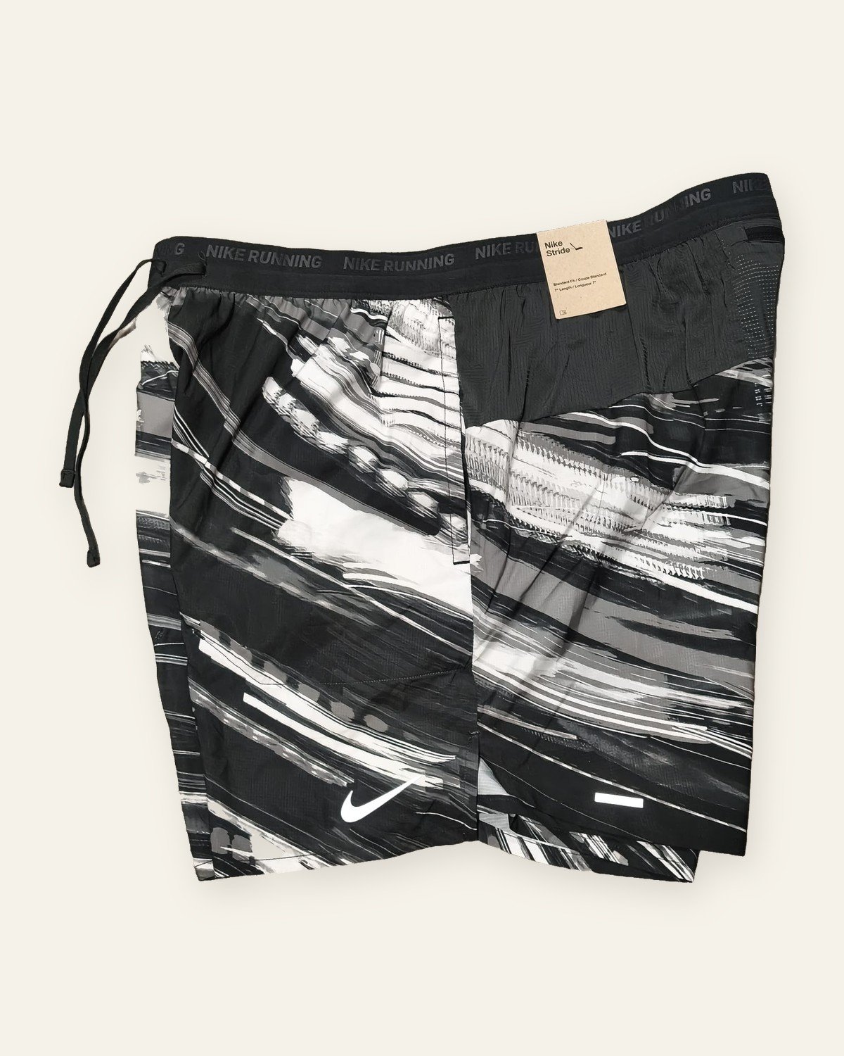 Nike Stride Dri-FIT 7-inch Brief-Lined Running Shorts, Black Print – side view